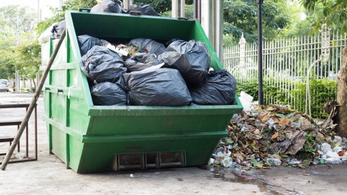 Expert giving practical advice for successful loft clearance in Harlow